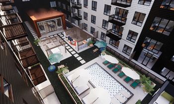 an aerial view of the courtyard of an apartment building